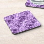 濃い紫色のクチクチしたテクスチャ コースター (左側)