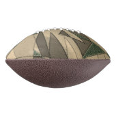 '濃い緑の背景'上のベージュ三角形切り出し アメリカンフットボール (回転90)