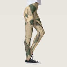 '濃い緑の背景'上のベージュ三角形切り出し