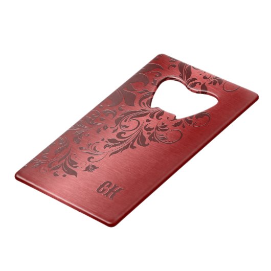 濃い赤の背景とフローラ旋回ジッポライター クレジットカード栓抜き (正面アングル)