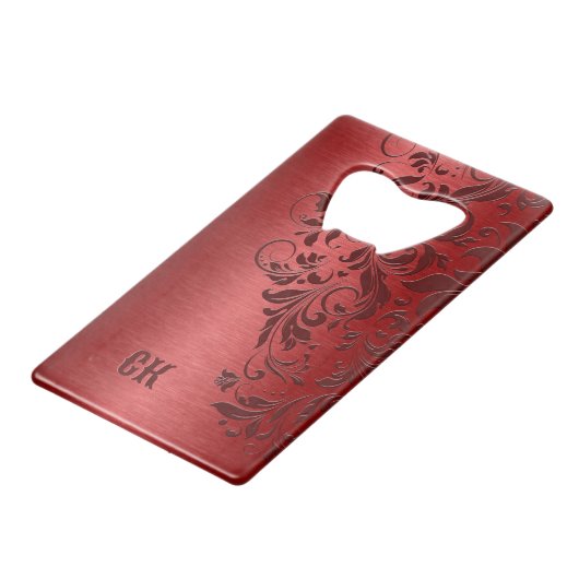 濃い赤の背景とフローラ旋回ジッポライター クレジットカード栓抜き (裏面アングル)