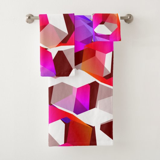 濃い赤の背景に多くの六角形が色付けされている バスタオルセット (インサイチュ)