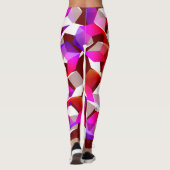 濃い赤の背景に多くの六角形が色付けされている レギンス (裏面)