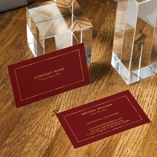 濃い赤の金ゴールド縁どとタイポグラフィ 名刺