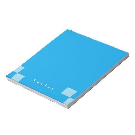 濃い青と薄い青の四角いブロックのパターン ノートパッド (回転)