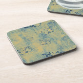 濃い青の蝶がオグランジン コースター (左側)