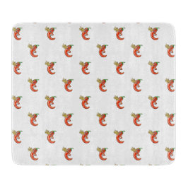 火おもしろいの上のスパイシーなチリ カッティングボード