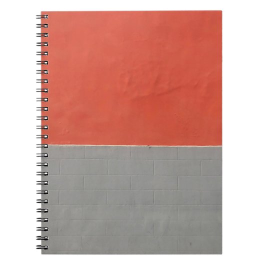灰色とオレンジ色彩の鮮やか色の壁 ノートブック (正面)