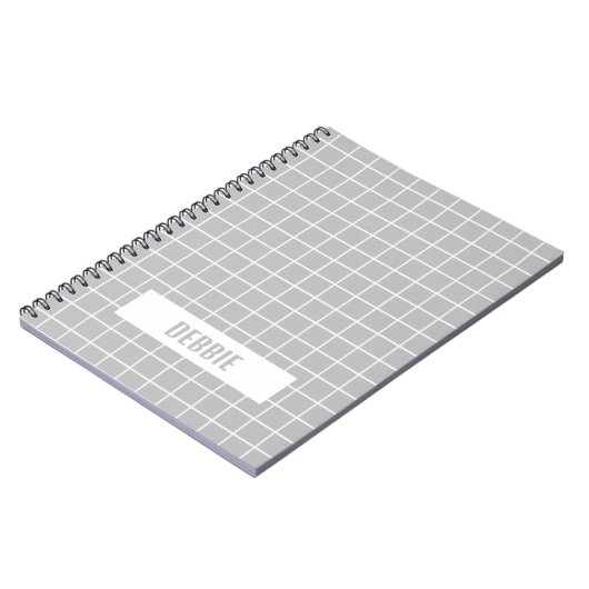 灰色と白のタイルブロックのカスタム ノートブック (左側)