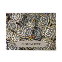 灰色と茶色のトーンの多肉植物ドアマット