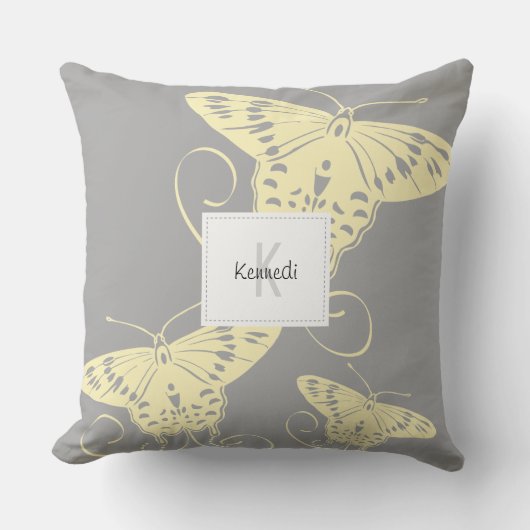 灰色のかわいらしパターンに蝶の黄色 クッション (正面)