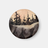 灰色のピンク色の空のアートと切り立った崖の上の暗い松 マグネット (正面)