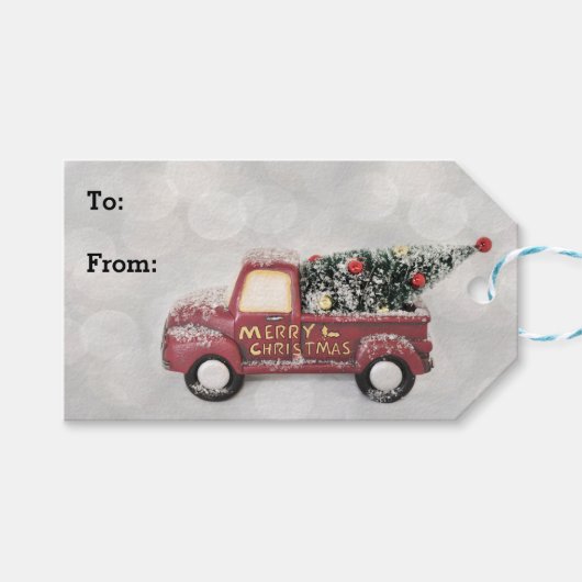 灰色のヴィンテージの背景に赤い《写真》ぼけ味トラック ギフトタグ (正面(横))