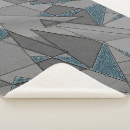 灰色の三角形の切り出しで粗い濃い青の部分 シェルパブランケット