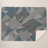 灰色の三角形の切り出しで粗い濃い青の部分 シェルパブランケット (正面(横))