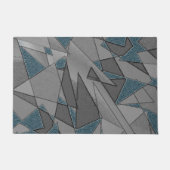 灰色の三角形の切り出しで粗い濃い青の部分 ドアマット (正面)