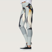 灰色の基壇を横切るかわいいペンギンの家族 レギンス (左)