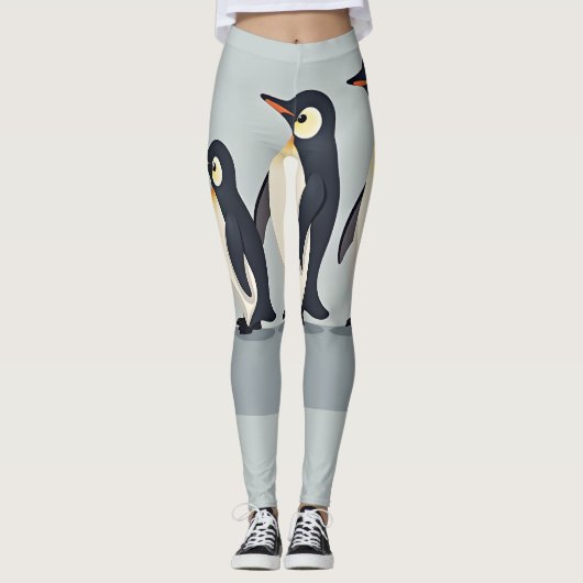 灰色の基壇を横切るかわいいペンギンの家族 レギンス (正面)