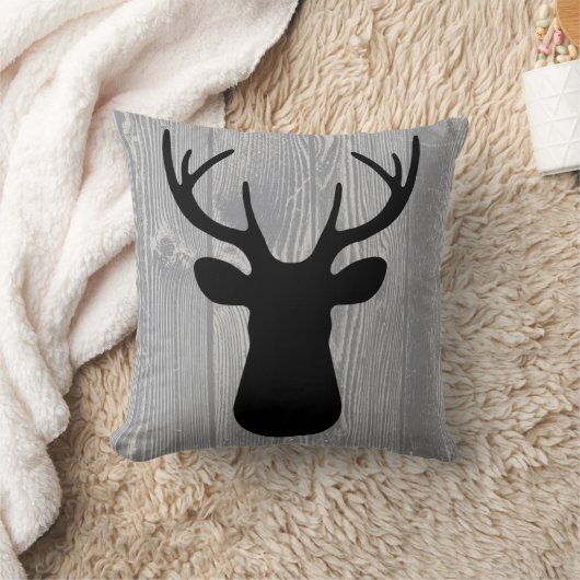 灰色の木製の黒いシカの枕 クッション (ブランケット)