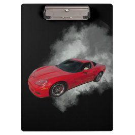 灰色の煙の取り外し可能な背景を持つ赤いコルベット クリップボード