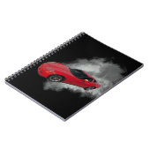 灰色の煙の取り外し可能な背景を持つ赤いコルベット ノートブック (左側)