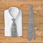 灰色の繊維織物のタコの種パターン（の模様が）ある ネクタイ