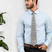 灰色の繊維織物のタコの種パターン（の模様が）ある ネクタイ