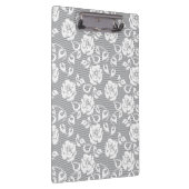 灰色の背景の白いレースパターン クリップボード (右)