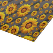 灰色の黒い花に美しい黄色のストライプ花 カッティングボード (角)