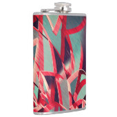 灰色または青の霧雨の多いイメージの上に赤い縞が流れる フラスク (右)