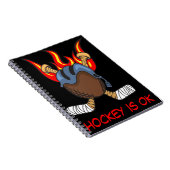 炎の中でパックとスティック、ホッケーはOK、スポーツ ノートブック (右側)