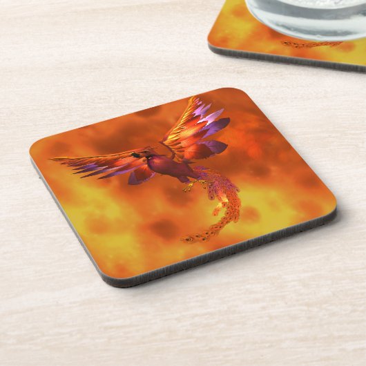 炎カラフルの飛んでいる背景に立つフェニックス コースター (左側)