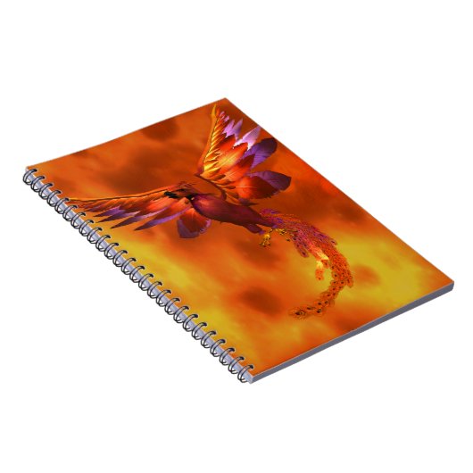 炎カラフルの飛んでいる背景に立つフェニックス ノートブック (右側)
