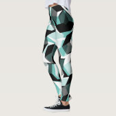 無色の部分を持つ多数の六角形、光ティール（緑がかった色） レギンス (左)