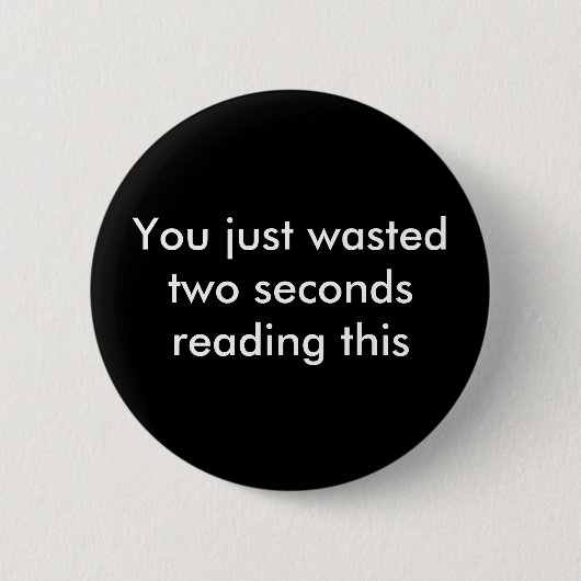 無駄にされる 缶バッジ (正面)