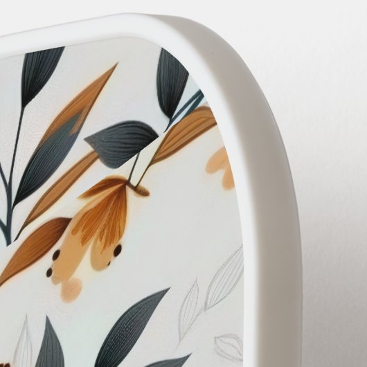 焦げたオレンジと白フィールド花モノグラム ピックルボールラケット (左詳細)