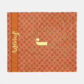 焦げたオレンジモダン色のフローラモノグラム フリースブランケット (正面(横))