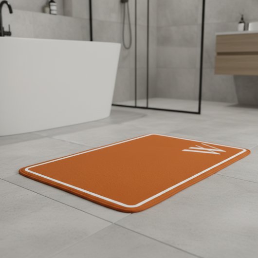 焦げたオレンジ色のモノグラム バスマット