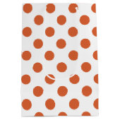 焦げたオレンジ色の水玉模様 ミディアムペーパーバッグ (裏面)