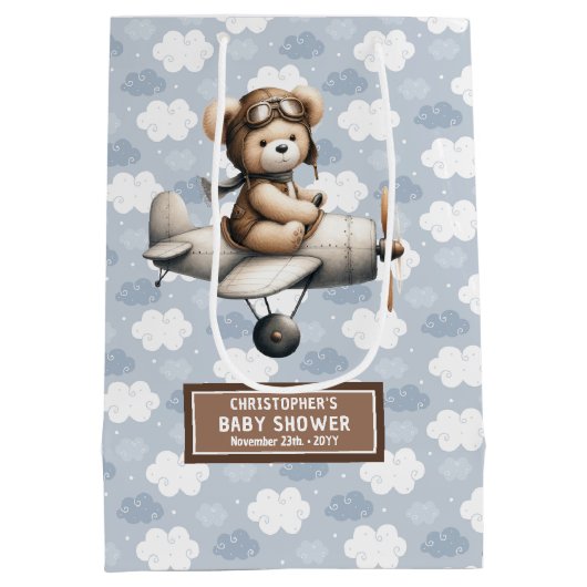 熊抱き枕付き男の子の赤飛んでいるちゃんシャワーデザイン ミディアムペーパーバッグ (裏面)