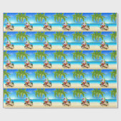 熱く明るいビーチでリラックスしているサンタ ラッピングペーパー (フラット)