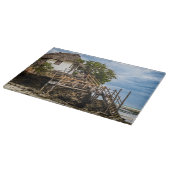 熱帯のサンゴ露頭の上の絵のような家 カッティングボード (角)