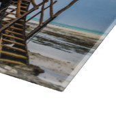 熱帯のサンゴ露頭の上の絵のような家 カッティングボード (角)