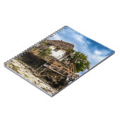 熱帯のサンゴ露頭の上の絵のような家 ノートブック (左側)