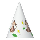 熱帯の葉を剥いだバナナを持つサル パーティーハット (右)