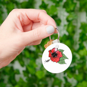 熱帯の赤いハイビスカスの花(緑離れの) キーホルダー
