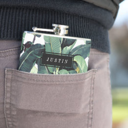 熱帯バナナの葉のヤシの木のビニールの包まれたなフラスコ フラスク