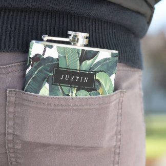 熱帯バナナの葉のヤシの木のビニールの包まれたなフラスコ フラスク