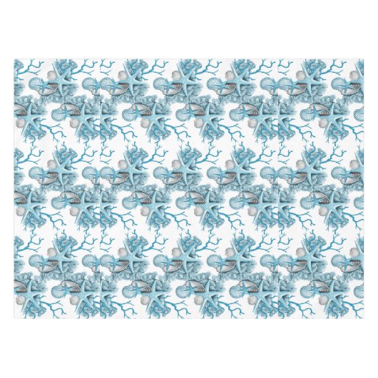 熱帯ヒトデは珊瑚の青く白い銀を殻から取り出します テーブルクロス (正面(横))