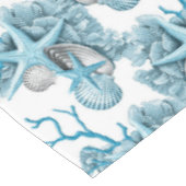 熱帯ヒトデは珊瑚の青く白い銀を殻から取り出します テーブルクロス (アングル)